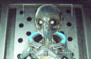 A captured Sectoid enjoys a complimentary luxury suite in XCOM's laboratory.